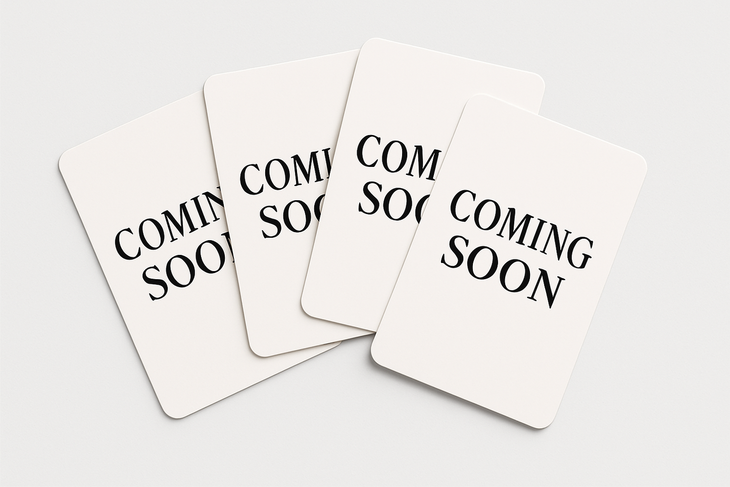 a blank set of 4 overlapping cards that each say coming soon